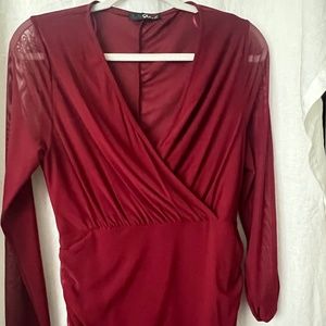 Burgundy plunging neckline and lace sleeve